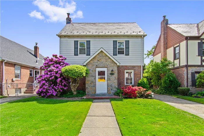 Beautiful Colonial w/ Slate Roof in Bayside Hills on a Quiet Tree Lined Street; Features 3 Bedrooms, 1.5 Baths, Kitchen w/ updated Appliances, door out to the level backyard. Living Room w/ Formal Dining Room, Hardwood Floors Throughout. Finished Basement. Extra Large Detached Garage. Extra Long Private 4 Car Driveway. This home has been maintained by longtime owner. Convenient to all shopping, transportation, House of Worship. Easy Access to All Major Highways. School District 26. Private backyard along with laundry room! Must see to truly appreciate.