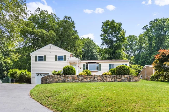 Rare opportunity to live at the end of this quiet cul-de-sac in a wonderful neighborhood. Sited atop a beautiful lot featuring breathtaking sunset views of gorgeous Hudson Valley. Once inside, you&rsquo;ll be greeted by a bright open floor plan perfect for entertaining or quiet gatherings. Completely updated chef&rsquo;s kitchen with stainless steel appliances granite counter tops and center island which easily seats 5 (barstools included). Off the kitchen, you&rsquo;ll find a bonus room currently being used as a Dining Room. The oversized family room features vaulted ceilings, custom built-in cabinetry and a wood-pellet stove. Work from home in the lower-level office complete with powder room. The third floor offers 3 large bedrooms with wall-to-wall carpeting (hardwood flooring underneath). Conveniently located near schools, shopping, town pool/community center and Taconic State parkway. Taxes do not reflect STAR rebate of $1, 967