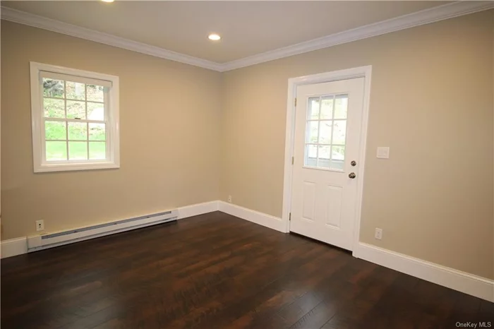 First floor bedroom with door to deck