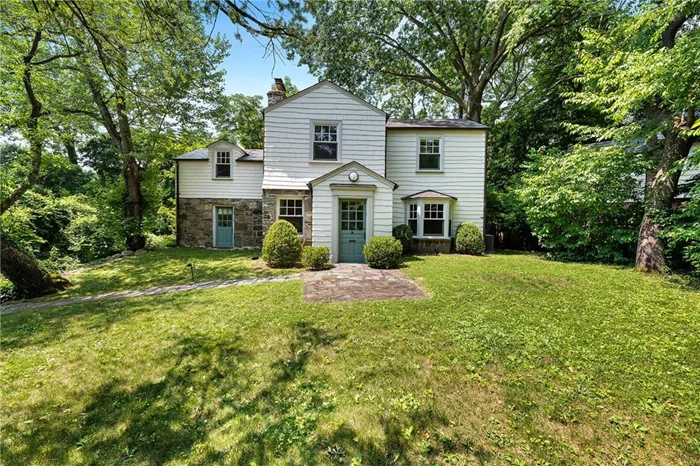 Nestled on a leafy private lane in Riverdale&rsquo;s Estate Section, this charming renovated early 1900&rsquo;s stone & shingled Colonial offers 4 bedrooms and 2.5 baths with all the comforts of modern day living. This light filled home has been meticulously renovated with no expense spared. As you enter, you are greeted by large light filled living room with a wood burning fireplace surrounded by modern stone mantel. There is a great dining room with an enchanting bay window overlooking the landscaped front yard. The stunning windowed kitchen with Poggenpohl Cabinets, Miele ovens, Pietra Cardosa soapstone kitchen counters, high-end faucets, 2 sinks, 2 dishwasher drawers, the list goes on Rounding off the first floor is a powder room, and a private family room with another wood burning fireplace and a private entrance so it can be used to as an office or a room to suit your needs.   The second floor offers 3 light filled bedrooms with a hall full bath, plus a private master suite with large walk in closet, renovated en-suite bath, with second floor laundry. Both Bathrooms have skylights and are designed from AFNY. The house has a slate roof, fabulous back brick & stone patio where you can dine and relax with the utmost privacy surrounded by mature greenery and trees.   This home has it all! New custom windows, 2 Zone central A/C, all new electric/plumbing, converted to gas heating, new water heater, copper gutters, Attached 1-car garage, plus extra parking in front of house, landscaped beautifully with sprinklers installed. You are close to all, from HOW, shopping and public transportation.  Centrally located in Riverdale with exceptional curb appeal, move right in and make this enchanting home yours before its gone!!!