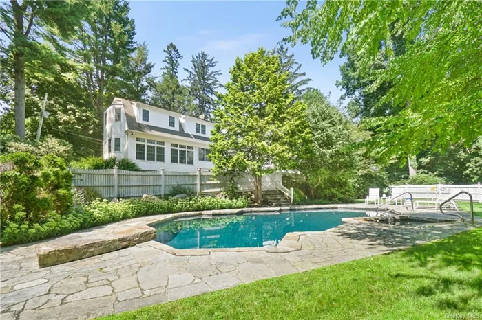 This Chappaqua charmer in a walk to town, train & school location on a private road is a total gem and is in move in condition. The house and property are top of the line in quality, charm & character. This open layout home is the perfect blend of old and new. Wonderfully landscaped property features an exceptional heated Gunite pool/spa and lush lawns. Dramatic light filled open spaces with walls of windows, hardwood floors & extensive millwork; an updated kitchen w/top-of-the-line stainless appliances and eating area; stunning living room w/fireplace and formal dining room; 5 bedrooms including a spacious primary bedroom suite w/laundry room, multiple closets, and private bath; large lower level with recreation room and full bath, 3 car garage; whole house generator; solar panels generating 12mWhr per/yr; multi-zone irrigation system; smart app operated house; above ground oil tank; security system & more. A VERY special offering!!