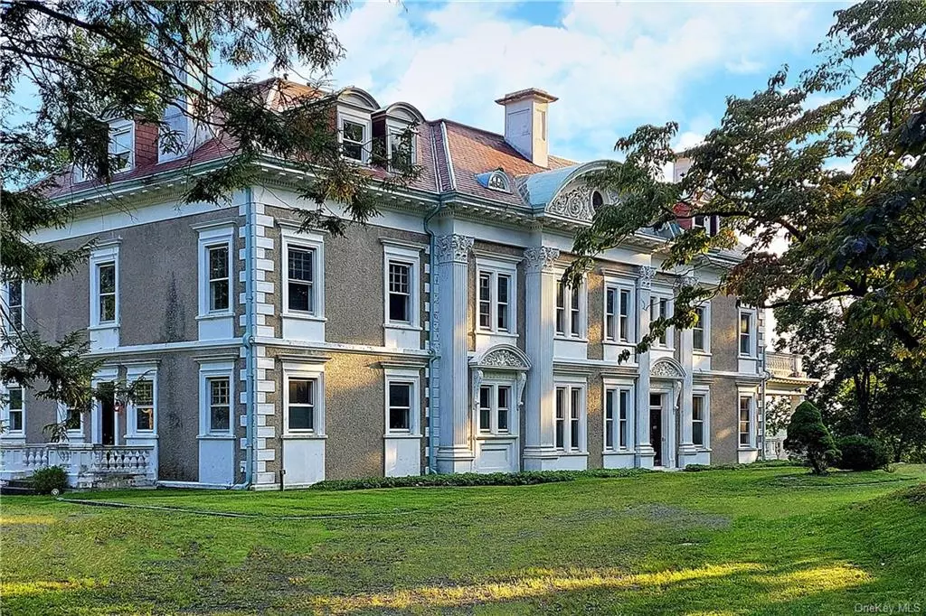 Riven Oaks was designed by James Lord Brown for Miss Mary LeRoy King c.1900. The property was sold to Eben Richards the son-in-law of railroad emperor, Henry Clay Pierce. Listed on the National Register of Historic Places. This renowned architect drawing details from the classical, with highly embossed curved pediment and tall Corinthian pilasters combine to make this one of the more imposing structures in Tuxedo Park. Picturesque, unique and beautiful Tuxedo Park founded by Pierre Lorillard IV in 1885 is recognized as America&rsquo;s first true gated communities. This spectacular 13, 000 sq ft home sits on a high point of the exclusive Tower Hill, offering mountain and lake views. After a careful multiyear phase of research, planning and designing utilizing the services of some of the most accomplished contractors, engineers and architects specializing in historic restoration and preservation is now ready for the restoration to begin. Private and Historic Tuxedo Park is 24/7 gate guarded within one hour to Mid-town Manhattan, offering swimming, boating, biking, fishing with endless miles of hiking trails accessible.