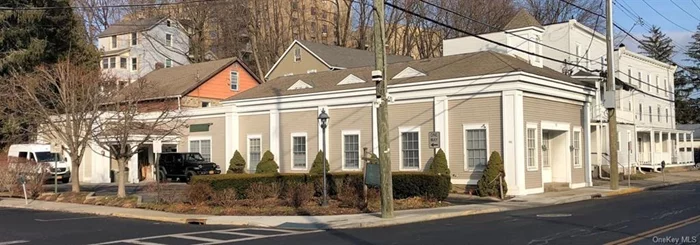 A unique opportunity to acquire space in Mt. Kisco, NY. This Property is a unique asset to the Mt. Kisco area and enjoys high visibility, both by its central position in the shopping district and its location adjacent to the Metro North (with quick access to the boroughs) and local bus stops. Property also has Potential to live in, rent or build up. There is a 3 Bedroom apartment above the building (currently being used as an office), includes bathroom but no kitchen. Parking can accommodate at least 8 cars. Buyers agent to verify taxes and all information.