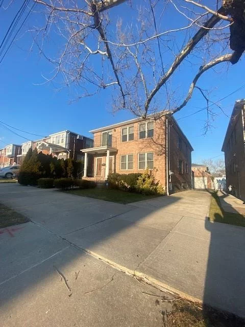 Detached ex-large brick two family home in the heart of Queens. This home features hardwood floors throughout, ample space, lots of storage, beautiful kitchen with stainless still appliances, each unit consist of 3 bedrooms & two baths, each unit has its own laundry area, there is central air & full finish basement that can be used as an in law suite.  Each individual units have its own boiler, two gas meters & three electric meters. Close to shopping area, transportation, schools & much more!  Give us a call today! Give us a call now!