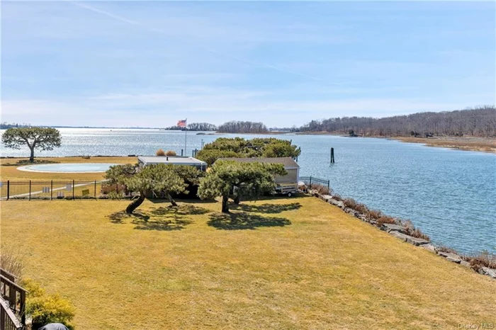 You won&rsquo;t believe the stunning SW-facing Water & Golf course views from this extraordinary Waterfront Townhome on sought-after Milton Point!! A very rare opportunity to bask in breathtaking vistas over the Pool & Lawn along Milton Harbor over Long Island Sound to the Manhattan skyline from your own private waterfront oasis. Beautifully tranquil Milton Harbor House location with private rear deck and large level lawn area down to the water. This dazzling home boasts a large open-plan Living Room/Dining Room combination with direct water views, modern white Kitchen, Den/Office and Full Bathroom on the First Floor. The Upper Floor has a spacious bright Master Suite with Ensuite Bathroom and stunning views out over the LI Sound to NYC, plus large 2nd Bedroom with Ensuite Bathroom. The lower Entry Level offers multiple closets & storage options, laundry and a meticulous 2-car tandem garage. Enjoy your dream lifestyle in this 24-hour security, gated waterfront community w. pool & dock!