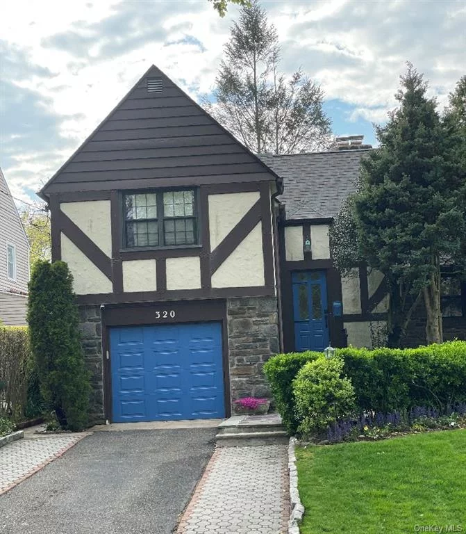 Welcome Home to Bronxville charm in the Fleetwood section of Mount Vernon! This home is a Tudor in move in condition, located on a dead end, tree lined street with finished hardwood floors throughout, a stone wood burning Fireplace, living room with wooden beams & is open to Formal Dining.French doors lead to a quiet den that boasts sliding doors to a deck and the rear patio. The Den also opens to the formal dining room and is separated by doors. Take a walk to Metro North, shops, restaurants and Fleetwood Nightlife. A Must see in Person !