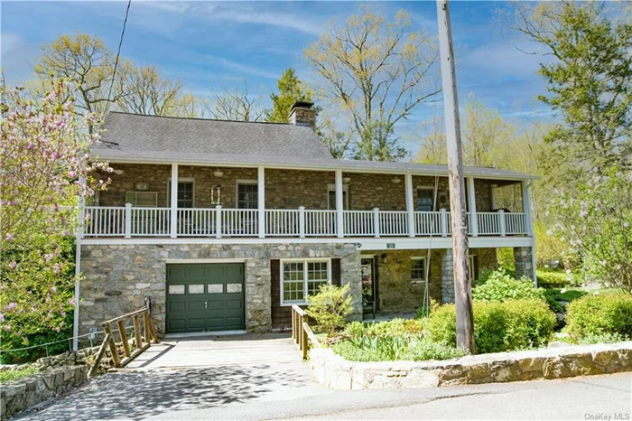 A taste of the Adirondacks! Enjoy that LAKE LIFE! Enraptured in stone & soft woods, this enchanted country haven is the perfect gem that awaits you. A restored 1930&rsquo;s Era Pub with all the charm/character you&rsquo;ve been waiting for. Property includes a babbling brook right outside two wooden bridges, soaring ceilings w/ exposed beams, huge enclosed porch runs length of house, professional quality appliances, woodwork and a dramatic stone fireplace w/ insert. PUTNAM VALLEY- a rural town 1 hour from NYC offering plenty of solitude, peace & privacy with a multitude of various nature activities. There are 3 lovely lakes & the fabulous Fahnestock State Park (14, 000 acres) allows hiking, fishing and more. Quick drive to the historical Hudson River towns including Garrison, the artistic Village of Cold Spring, Hyde Park & West Point. You can embrace this dream everyday full-time or escape as a weekender & summer home. Comfort in the country!!