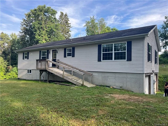 Town of Newburgh, WALLKILL SCHOOLS! Beautifully updated home on 25.8 acres!! Beautifully refinished kitchen with white cabinets and quartzite countertops. Stainless appliances and an oversized island make this a dream kitchen! Open floor plan flows nicely to both the living room and the dining area. Fireplace in living room. 2 sliding patio doors (with transoms) allow for a ton of natural light, and also open up to a spacious back deck. Excellent flooring choices are sure to impress! 3 bedrooms, and 2.5 bathrooms. Owner&rsquo;s suite bathroom has shower, jetted tub, double sinks, and gorgeous tilework and color choices. Walkout basement is currently unfinished, and could almost double your living space if you choose to finish it. 2 car attached garage. On-demand hot water. Water treatment system (ozonator/UV/filtration). Recent furnace and central A/C unit (2019). Switched to propane fuel (cleaner, cheaper, more efficient). Ready to move in, and room to grow!!