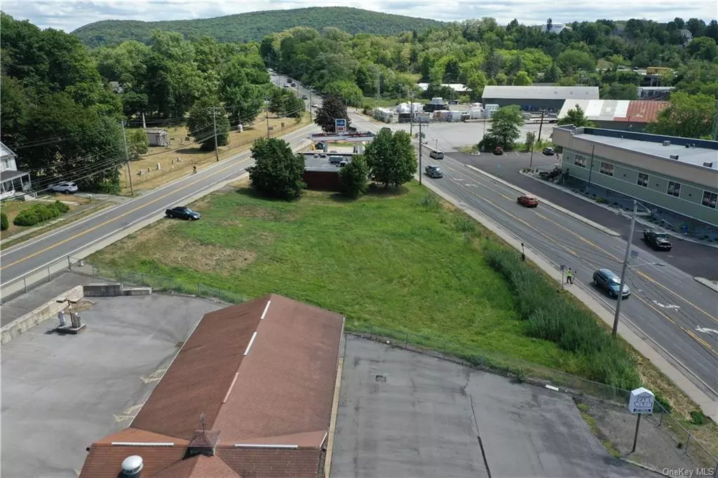 Open commercial lot directly behind the existing Cumberland Farms and just to the east of the former Brookside carwash. Good use may be for a parking lot for a building built on 42 Brookside.