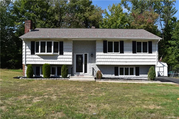 TRUE MOTHER/DAUGHTER HOME! This 5 bedroom, 2 bath home has been completely renovated so there is literally nothing to do but unpack. The upper level boasts a stunning kitchen with bright white cabinetry, granite countertops, stainless steel appliances, tile backsplash and access to a massive screened-in porch overlooking the level backyard. The formal dining room and family room w/ woodburning fireplace each have a large bay window contributing to the amazing natural light that this home offers. 3 nice sized bedrooms and a full bath complete the level. Beautiful, just refinished hardwood floors throughout the entire level. The lower level has it&rsquo;s own entrance and offers a second FULL kitchen, large family room, 2 additional bedrooms, a full bath. Other features include: central air, town services, newer roof, gutter heaters, and a shed. Perhaps one of the best features is the access to the Woodbury recreation which offers a community lake & pool as well as walking trails, soccer fields, paddle boats, baseball fields, picnic areas, a playground, & more!