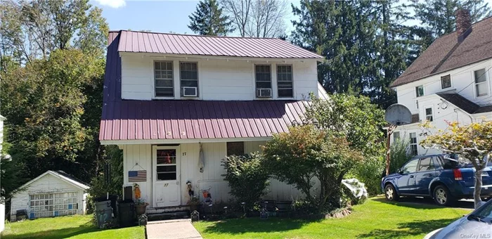 Conveniently located within walking distance to town, close to shopping and the highway located in a quiet neighborhood. Three bedrooms, two full baths, living room, and dining room with a brand new boiler and hardwood floors. The home is being sold as is.