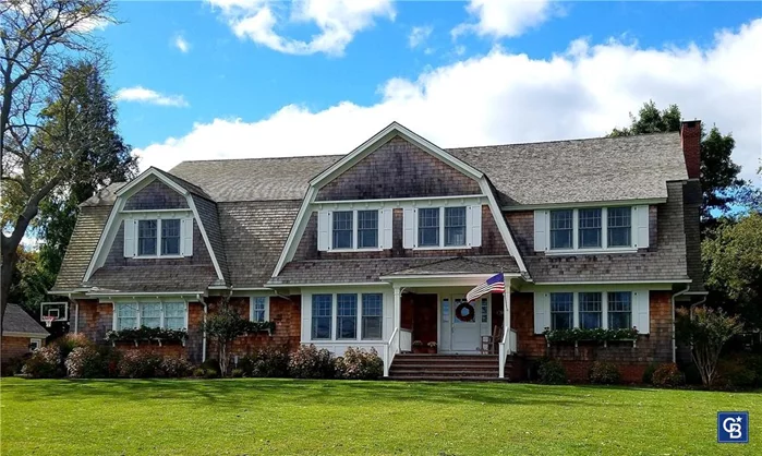 This beautiful 5, 556 square foot Hamptons style, red cedar shingle home overlooks scenic Little Bay and is abutted by a wooded preserve. Designed by Michael Macrina Architect, and custom built by North Shore Home Design Inc. in 2013, this home boasts abundant natural light and spectacular sunrise views. Five bedrooms, four and a half baths with 9 and 10-foot ceilings throughout. The top floor, accessed by two sets of stairs, features a spacious primary suite with water views, a spa-like marble bathroom with a heated floor and an oversized jetted soaking tub, an adjoining art studio or nursery and large closets; 3 additional bedrooms, an exercise room, and an expansive billiard room with a vaulted ceiling. A cozy study with wainscoting and built-in shelving and storage is off the front entry, along with a spacious dining room. Rounding out the first floor is a spacious family room with a red brick wood-burning fireplace and coffered ceiling, a large guest room with an ensuite, a mud room and a laundry room. Hardwood oak flooring throughout.   The vast entertaining space features a chef&rsquo;s dream gourmet kitchen with Subzero/Wolf appliances, including an eight burner dual fuel range, one hundred and forty-six bottle wine refrigerator, an under-the-counter ice maker, wet bar, granite countertops, beadboard ceiling, large pantry and custom cabinetry. Off the kitchen is an oversized rear porch with a built-in Wolf grill and beverage refrigerator overlooking the spectacular 40&rsquo; x 20&rsquo; heated gunite saltwater pool with red brick and bluestone surround. The spacious one-acre yard with ten zone irrigation system and mature plantings is meticulously maintained. Liquid propane gas heat with a whole-house standby generator. Two-car garage; additional detached one-and-a-half car garage, with ample storage space. This home is located in the Three Village Central School District.