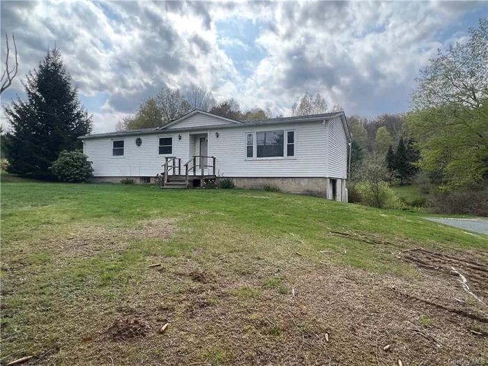 Well-maintained ranch home in the town of Neversink! Ideally located just outside the town of Grahamsville, this 3 bedroom, 1.5 bath is the perfect home for somebody looking to establish roots in a great community. Situated on a private 2-acre parcel directly across from the recently built Town of Neversink Community Park, which offers 4 baseball fields, a paved walking trail (that allows pets), beautiful mountain views, and outdoor workout stations for the health enthusiasts. Recent upgrades in the home include a new roof and kitchen appliances. There&rsquo;s an abundance of public land near by if you&rsquo;re interested in hunting, fishing, hiking, or kayaking.  Tri-Valley schools, low taxes and town sewer - make this a great buy. This won&rsquo;t last long! Call now to schedule your viewing.