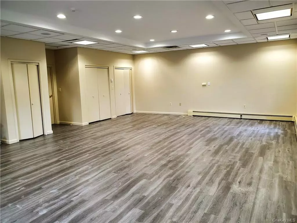 Previously home to a busy physical therapy practice, this large space is approximately 36&rsquo; x 24&rsquo;+ and boasts fresh paint and brand new flooring. Ideal for a spa/wellness center, yoga/pilates studio, urgent care, dialysis center, medical office, dental office, PT, OT, it would serve equally well for attorneys, accountants, etc., or almost any business office. Easily accessed from all directions, this convenient and highly visible location and prominent building is a quick ride to the thriving Village of Warwick downtown. With natural light from windows along two walls and sporting a unique coffered ceiling, this will be a special place for you and your staff and your clients/patients. They&rsquo;ll be sure to appreciate the on-site parking, single-level/no stairs access into both the building and office, and convenient lobby bathroom.  Another small office is available and listed separately.
