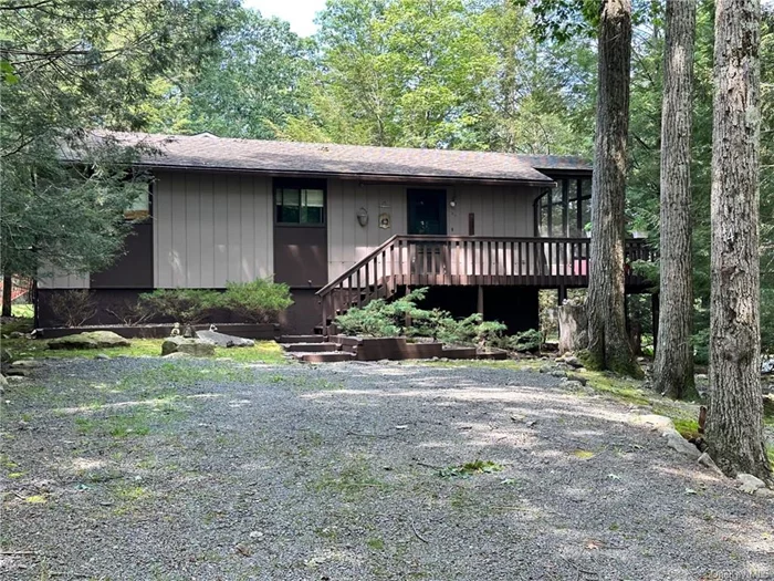 Raised Ranch in the desirable Emerald Green Lake Community. Features 3 bedrooms, 2 baths, with eat in country kitchen and living room. Oak floors in the main level. Lower level has a nice family room with patio doors, a propane stove, a laundry room and unfinished room for storage . Sliders lead to a screened in porch for relaxing or entertaining. Very private setting on a corner lot with many trees. Emerald Green offers members 3 lakes to boat and fish, 2 new heated swimming pools, tennis courts, renovated facilities with start of the art exercise area. Community functions for all ages. Only minutes to the new Resorts World Catskills Casino, Kartrite Resort and Indoor Water Park, Bethel Woods Center for the Arts, and Racino. Less than 90 minutes from NYC.