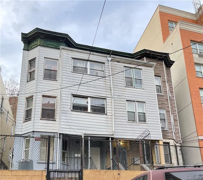 Great income-producing property near public transportation, stores, and parks. You can live in one unit and the rent you collect from tenants can help pay your mortgage. This affordable three-family property qualifies for an FHA first-time home buyers mortgage.