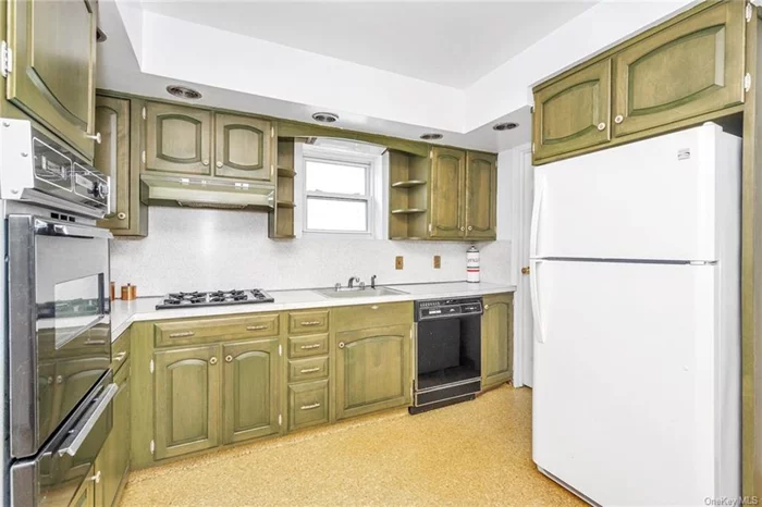 Large eat-in kitchen, pantry and full bath.