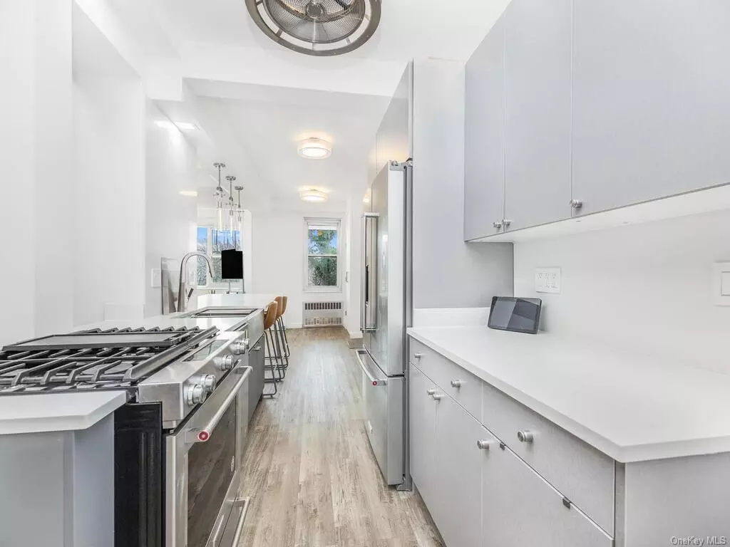 THIS IS A FULLY FURNISHED COMMUTERS DREAM!! Welcome to this One-of-a-Kind Modern Custom Renovated 1 Bedroom in the Heart of Spuyten Duyvil. Owner has Spared No Details in Design, Functionality, and Comfort. This Unit Features a Foyer Area with Custom Built-In Shelves. The Large Living Room Allows for Many possibilities with restored brushed nickel windowsills to capture the sunlight and brighten your day along with restoring the original radiators. Some of the Space is Currently being Used as your Own Work Out Space Already Set with Some Workout Equipment and Mats for padding for a functional gym when you are on the go. The Large Windows facing the Henry Hudson Bridge gives breathtaking views of the Hudson River. The kitchen features a Modern Sleek look With Energy Efficient Stainless Steel & Modern Appliances and Tons of Cabinetry as a complete package to a Chef&rsquo;s dream. There are tons of Countertop Space that Can Seat up to 8 People. You can Enjoy Tons of Natural Light in The Bedroom Thanks to The Large Sized Windows That Also Gives you a Very Soothing View. This Beautiful Bathroom with One-of-a-Kind Finishes and fixtures features with Smart Technology Moen Spa Shower and a Wet Fan (app enabled) to eliminate moisture with Summer and Winter features as well as 2 mirrors with medicine cabinets and 10 outlets in the bathroom finished with a beautiful barn door That is Not Only Functional, But Very Chic. Some of the Other Features of This Unit Includes, but are not limited to Dishwasher, Elegant Vinyl Flooring Throughout the Unit and Very Modern and Unique Ceiling Fans in all the rooms and tons of Storage Space. Lastly, the Terrace has a custom fabricated odor resistant, soundproof, mold resistant privacy wall and a cantilever umbrella that is perfect to enjoy the view of the Hudson on a Sunny Day. The Terrace also has lighting added to enjoy evenings outside with GFCI outlets for convenience. Building Amenities Include Storage for an Additional Fee, Laundry Room/ Common, Part-time Doorman and parking around the building. Just a short distance away from some of NYC&rsquo;s most beautiful attractions, including Wave Hill, the Botanical Gardens, the Bronx Zoo, Van Cortlandt Park and more! A quick drive to both Westchester, NYC, & NJ. A few hundred feet away to the Spuyten Duyvil Metro North station, GW Bridge, and a block away from the Express Buses to Manhattan and local buses to meet the 1 and A trains.