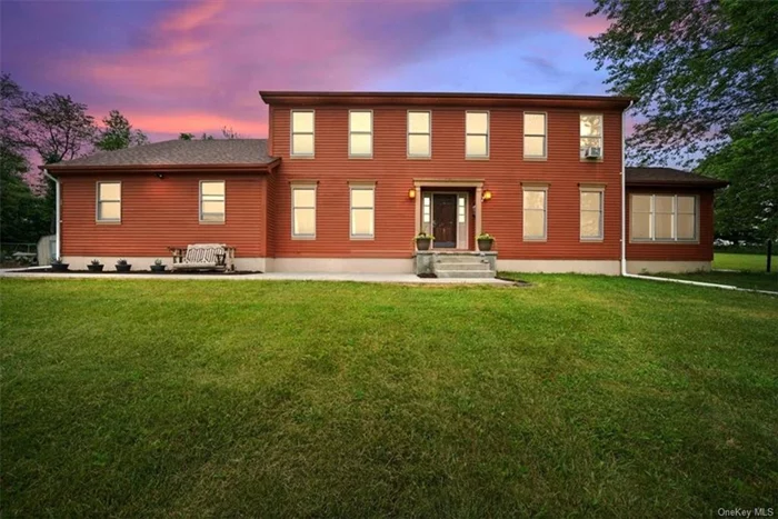 Experience the charm of this amazing center hall colonial in the pine bush school district. Majestically perched atop a hill on 2.6 acres of land it is completed with mountain views. This 2, 989-square-foot home features 4 bedrooms and 2.5 baths. The first floor welcomes you with a grand center hall entrance, flanked by a dining room on one side and living room on the other. The living room leads to an inviting den/office space complete with a cathedral ceiling and pellet stove. The open-concept kitchen has been recently updated with stainless steel appliances, butcher block countertops, and a charming farmhouse sink. The kitchen flows seamlessly into the family room, featuring a wood-burning fireplace and easy access to your backyard paradise via sliding door. Additionally, the first floor includes a powder room and a spacious laundry/mud room. Upstairs, you&rsquo;ll find 4 bedrooms and 2 full baths. The expansive primary suite boasts an ensuite bath with walk in closet, a shower, whirlpool tub, dual sinks, and a water closet. The unfinished basement offers endless possibilities; ready to be transformed into a playroom, studio, or home theatre. The attached two-car garage features a bonus side work and storage area. But wait, there&rsquo;s more! The detached 4-car garage is a collector/mechanic&rsquo;s dream that can support a lift. This structure also has a bonus space above which features its own private entrance. Currently designated for storage, this versatile space can easily be converted into a guest suite or private office with full utilities.