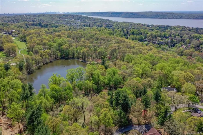 Fully available! Prime building lot in an excellent neighborhood with site plan approvals. Located on a dead-end street in Irvington, NY, this 1.40 acre vacant lot is waiting for your dream home. The property is adjacent to the beautiful and bucolic Halsey Pond---a five acre pond surrounded by a passive park of walking trails and historic stone structures. Having potential for lovely views of the pond, the land offers a backyard of peace and beauty. With limited site plan approvals already obtained to include a house, feel free to design your perfect home. Electric and sewer are on the street. House will require an individual building permit adhering to village ordinances; taxes are estimated. Two additional lots of similar size are also available for sale. Irvington NY is a lovely town along the Hudson River with Blue Ribbon Schools. Enjoy a charming downtown area with shops and restaurants as well as a Metro North station, only 40 minutes to NYC! Create your perfect life on Castle Road! Agents: email, do not text