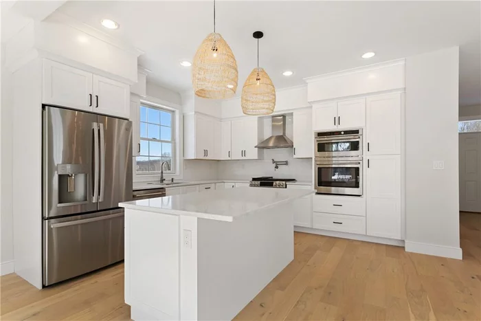 Open Kitchen with Stainless Appliances