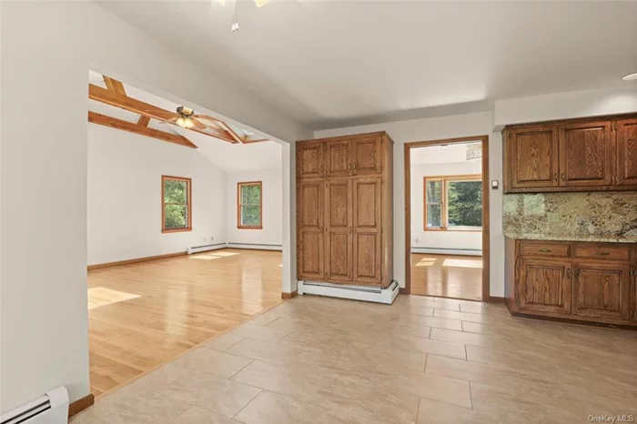 Inviting Family room is open to Breakfast area and Kitchen. Ample size Kitchen pantry.