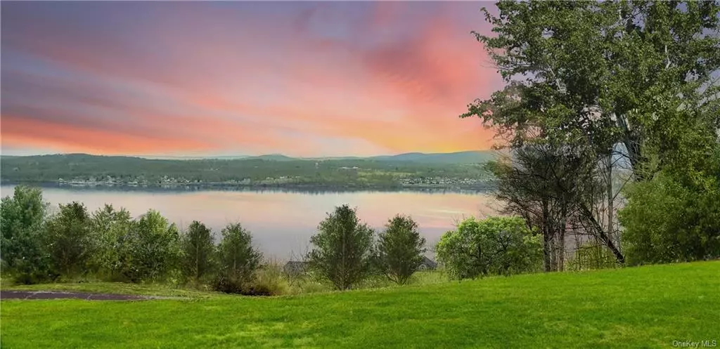 Lot #1 214 Hudson Hills is a prime piece of land located in the desirable Balmville area of New York. This beautiful property boasts stunning panoramic views of the Hudson River, surrounding hills and the Newburgh/Beacon bridge, making it an ideal location for those seeking a tranquil and peaceful environment. This picturesque piece of land is surrounded by natural beauty, with lush greenery and mature trees adding to its charm. The property also features Million dollar Hudson River views from any room in your home. The property is located in Balmville which provides convenient access to local amenities and services, including shopping centers, restaurants, brewery&rsquo;s entertainment venues. 10 Minutes to Metro North, or NYS through way. This is a buildable lot, all you need to do is the perk test and contact your builder.