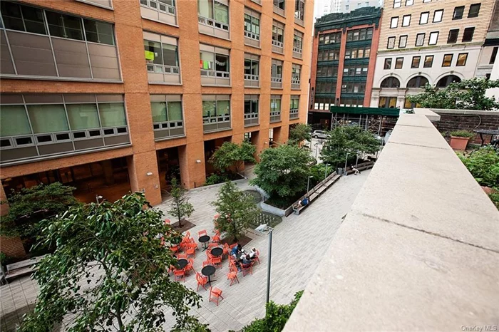 Enjoy this condo’s outdoor space overlooking a quiet park