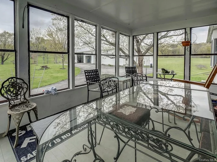 This light filled 3 season screened in porch will be your favorite place to relax, have breakfast or dinner watching the sunset!