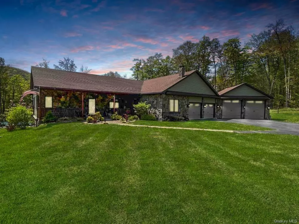 Exceptional 5, 000+ sqft, custom-designed ranch on 6+ acres nestled in the Catskills, featuring 5 BD/4.5 bath, home office/gym, & pool. An entertainer&rsquo;s dream complete with cherry wood floors, granite counters, handcrafted stonework, custom chef&rsquo;s kitchen, & abundant closets. Enter into sun-filled open concept great room, kitchen, & dining room with cathedral ceilings, stone fireplace, & sliding doors to wrap-around deck. 1st floor Primary bedroom suite complete with fireplace, WIC, & jacuzzi tub.   Lower level has large entertaining space with wet bar. Outdoor private oasis has stunning views, heated saltwater pool w/ remote automation, hot tub, blue stone patio & fire pit, 4-car attached garage, generator, & large storage shed.   Property includes pond & cleared hiking trail for private access to world-class fishing on Willowemac Creek. Off property, discover hiking, boating, skiing, snowmobiling, golf, restaurants, breweries, live music, Bethel Woods, Woodstock Museum, & theaters