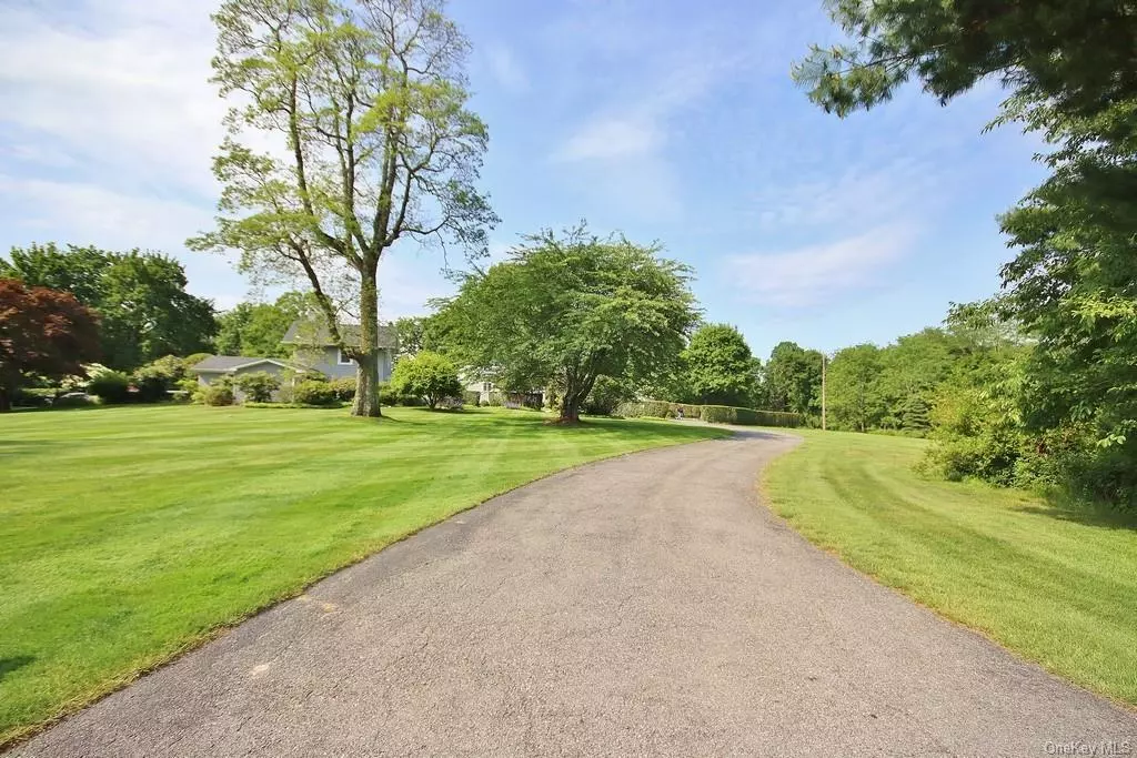 This sprawling historic estate originally called Stornoway Farm, circa 1887, sits on almost 5 acres of manicured property, which has been lovingly maintained by the same family for over 56 yrs. The main house has been renovated while keeping original architectural details like Southern red pine floors, 11&rsquo; ceilings, & original extra wide front door. There is an extensive vegetable/herb garden, 20&rsquo; x 45&rsquo; pool with cabana, patios, fenced in horseshoe pit/dog run, playset & firepit & always something to enjoy. The main floor includes an updated kitchen w/stainless appliances, granite counters, breakfast rm/butler&rsquo;s pantry, radiant heat, mud rm w/laundry off the kitchen, powder rm, formal dining rm, living rm & family rm each with a fireplace, sun rm, & a primary bdrm suite. Second flr has a large bdrm w/enclosed porch, walk in closet & plumbing for bthrm, 3 additional bdrms, door to deck, full bath, & Jack & Jill bath. Additional features: Polaris automatic pool sweep, 19 zone irrigation system, high efficiency furnace, new well pump, 6 zone heat, updated septic fields, above ground oil tanks, 2 garages (1 car & 2 1/2 car), & circular drive. The guest cottage has an additional 3 bdrms, 1, 184 sq ft (not included in total count) & private patio. With the vast specimen plantings, there are flowers always blooming! Plan your next wedding or horseshoe tournament here. An entertainer&rsquo;s dream! There are no audio recording devices inside this property.