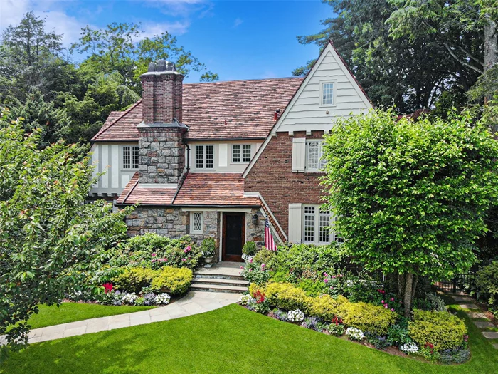 A 1929 architectural beauty reimagined for modern living and nestled in the heart of Larchmontâ€™s prestigious Rouken Glen hamlet! Exquisite in every way â€“ original hardwood floors character laden and meticulous, stunning millwork with graceful archways, and abundant light from walls of new windows. A home made for entertaining, from the elegance of the large sunken living room with glossy coffered ceiling and fireplace, to the chic family room with crisp white built-ins and 2-sided gas fireplace to the kitchen. This designer space is pure gourmet with a sunny breakfast area that opens through French doors to a bluestone patio and blissfully private backyard with fire pit. Thereâ€™s a gorgeous statuary marble island with seating, convenient built-in desk, wet-bar area and swing door to a seriously stylish dining room with striking wood paneling. This floor also boasts a powder room off the entry vestibule and an idyllic library with walls of built-ins and access to patio. On the 2nd floor are 4 fabulous bedrooms including the primary haven with 2 WICs and spa-like ensuite, plus an updated hall bath. The 3rd floor boasts a 5th bedroom, office and updated hall bath. An ADDITIONAL 1, 132 SF in the walk out lower level which includes 473 SF original billiard/rec room, plus laundry, powder room, mudroom area, bonus area ideal for gym and attached 2-car garage. Walk to Murray Avenue Elem, Leatherstocking Trail, close to train & Village!