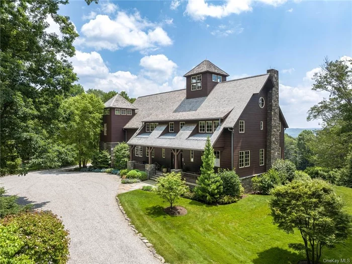 Stunning converted barn on 8.6 acres with spectacular southern exposure and views. The property offers supreme privacy amid a dazzling landscape. The house, is post and beam construction, custom built from reclaimed lumber. Massive exposed framing centers on a great room with a three story atrium and floor to ceiling windows. Incredible attention to detail and design are evident throughout three floors of beautifully finished living space. A large elevated deck and stone terrace with outdoor kitchen overlook a sparkling 20 by 40 saltwater pool and acres of open lawn. A charming three bedroom guest house is accessed from a separate branch of the driveway. Adjacent to 200 acres of Audubon land and hiking trails, this ultimate turnkey retreat is approximately one hour from Midtown Manhattan. Come live the dream in beautiful North Salem.