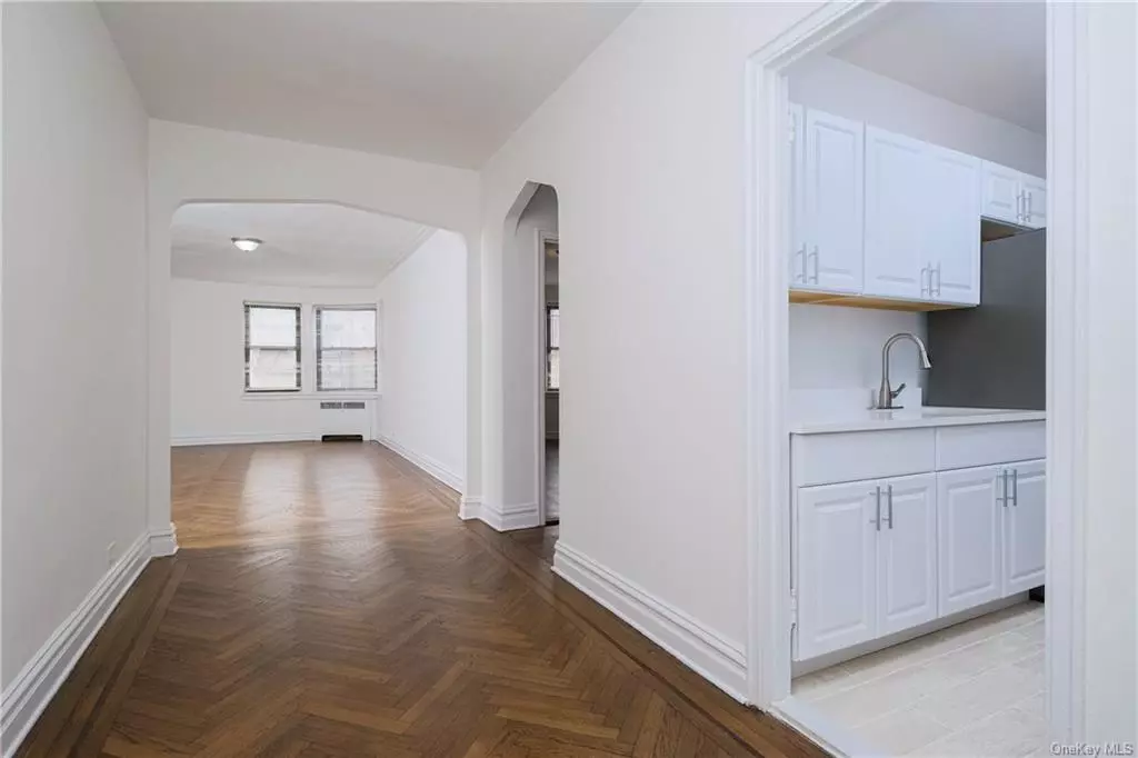 1855 GRAND CONCOURSE Apt. 44 - SPONSOR UNIT (No Board Approval) front-facing Bronx-Deco Junior 4 converted to 2 BED/1 BA w/ open east & south-facing views directly onto the Grand Concourse. Just 20 minutes north of midtown NYC & (3) X/P stops from Columbus Circle via IND B/D Subway. 1, 111 s/f of elegantly arranged living space: Entry/Dining Foyer, Living Room, renovated windowed Kitchen & windowed Hall Bath, 2nd BED/Den. Extant architectural details: high ceilings, plaster walls & archways skim-coated & painted, refinished herringbone parquet floors. Move-in ready. Intimate, well-managed 6 story, 44 unit Bronx-Deco elevator apartment building attributed to architect Thomas Dunn ca. 1936, whose earlier work includes Thomas Aquinas Church on Crotona Parkway ca.1924. 80% Financing MAX. Join the emerging renaissance on the Avenue des Champs- lys es of The Bronx. Actual Maint. of $1, 074.47 incls. H&H/W b/4 STAR. Subletting allowed after 2 years w/ BoD approval. No dogs/no investors, please.