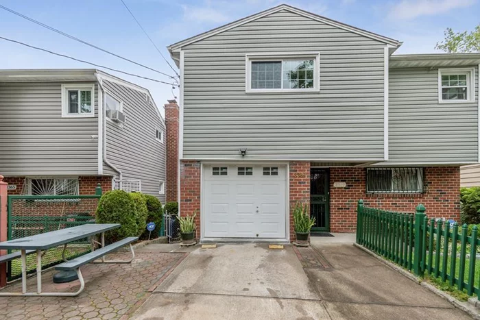 Detached single family home in the Eastchester neighborhood.  This house features four floors of living spaces and can be uses a mother / daughters home.  First floor has a larger bedroom/ den with a full bath and half with entrance to the lower level with a full kitchen , washer/ dryer . This area can be use for rental income or an in- law apartment .  On the second and third floors is the main living areas , three bedrooms , extra large living room , spacious window eat- in kitchen , with one and a half baths. New windows in very room .  Other features are: Three access to your exquisite fence backyard with Up- ground pool perfect for family gatherings and BBQ, gazebo and plenty of space left over for garden, one car garage with extra parking on the drive-way. Central heat and air condition, four exposure make this home very bright. Updated graded water heater, roof is in good conditions, lots of storage, this home is move in ready. Centrally located # 5 train only one block away. low taxes make this home very affordable