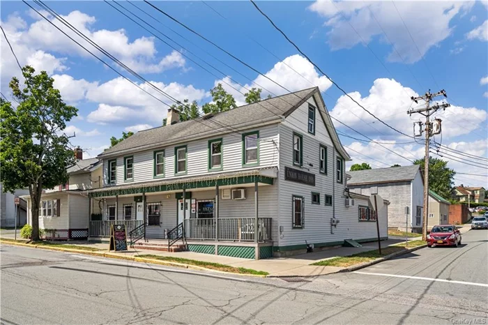 UNIQUE INVESTMENT OPPORTUNITY!!! BUSINESS INCLUDED IN SALE!!! Nestled in the Village of Walden located on a corner village lot (corner of John St and Hepper St) just off major Route 52 and Route 208, surrounded by a variety of local established businesses & shopping centers is this property featuring just over 6, 000sqft which is actively conducting business as a well known local bar & restaurant, includes a commercial kitchen w/equipment, food & supply storage area, business office and two half baths all on the first floor. 2nd floor features 10 single hotel style room rentals sharing 1 full bath w/shower stall and one half bath. In the rear of the building features an addition serving as a 1 bedroom apartment & full unfinished attic & basement. Also included is a separate parcel currently utilized as business parking for 10+ cars. This is a unique opportunity so don&rsquo;t delay! Here is your opportunity to invest or become an entrepreneur today!!!