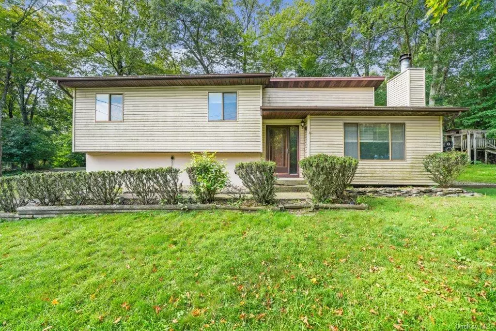 Spacious and roomy three bedroom contemporary home with great curb appeal. Oversized back deck perfect for entertaining on almost half an acre in Monroe-Woodbury School district.  Eat-in-kitchen, formal dining room and some hardwood floors.  Minutes to Route 6 and NYS Thruway and trains/buses. Easy commuter location. Sold as-is. Buyer to pay NYS and any local transfer taxes. Offers with financing must be accompanied by pre-qual letter; cash offers with proof of funds. **Please see agent remarks for access, showing instructions and offer presentation remarks.**