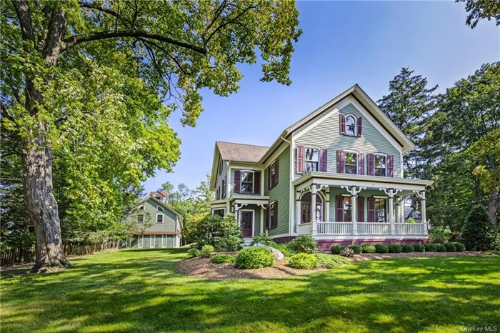 Available for the first time in 50 years, this iconic Victorian in the heart of the Village of New Paltz blends unbeatable walk-ability with architectural charm and a rich menu of potential future uses. The picturesque property, set atop a tree-canopied bluff overlooking Village Hall and mere steps from Main Street and the SUNY New Paltz campus, features a 3, 669-square-foot, 3-story main house with an incredible catalog of original details still intact, including ornate fretwork on the front and back porches, well-preserved clapboard and louvered shutters, rounded doorways, bay windows, built-in bookcases and an unique spider-web-patterned maple floor with mahogany inlay in the formal dining room. The tall ceilings and oversized windows throughout the house give it a sunny, light-filled sense of openness, especially in the unusually large kitchen and living room. A finished third floor, with full bathroom, offers additional space for guests or storage. Directly behind the house sits a large renovated barn building, now adapted for use as a professional office space, with a 3-car garage plus an additional 2, 431-square-feet of finished rooms on 2 floors, including 5 offices, a kitchenette, 2 half bathrooms, a conference room, and a paneled executive suite with its own library loft crowned by a windowed cupola. The entire .54-acre property, which includes ample off-street parking, is classified as one parcel but with split zoning: R2 (two-family) for the house, and B2 (core business) for the barn building, offering a variety of potential options for future use, both residential and commercial. Even better, that flexibility is coupled with proximity  90 minutes by car to Manhattan and about as many seconds by foot to both the SUNY campus and bustling Main Street  making this a unique live-work or investment opportunity in the Hudson Valley&rsquo;s most popular college town. NOTE: Zoning designations (R2 for the house and B2 for the renovated barn building) are as provided by the Village of New Paltz, and should be confirmed by Buyer Agent. Floor plans for each building, as well as the Village-published list of permitted uses for the property, are available in Associated Documents or upon request. Total square footage for the house (3, 669) is as per county property records, while finished square footage for the office building (2, 431) is as measured by the Listing Agents; both should be confirmed by Buyers Agent.