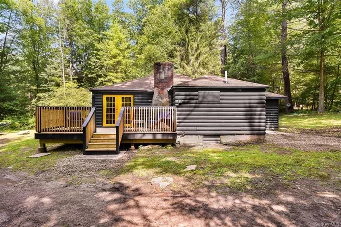 Nearly 40 private acres nestles this newly renovated rustic log cabin in the quaint hamlet of Narrowsburg. The private and beautiful property hosts a spring fed pond, streams, trails, mature trees and abundant wildlife. The 2bd/2ba cabin has been rejuvenated to an open concept kitchen/living, dining room with stainless appliances, pantry, kitchen island and storage window seats peering out into the property. One bath offers a soaker tub while the other features a walk-in shower. A wood stove warms the primary bedroom with French doors to a relaxing deck and the sound of trickling streams. Deeded right of way access to the Delaware River is right across the road for fishing, swimming, kayaking or just relaxing the waterfront. A large shed and workshop are out back behind the cabin. Possible subdivision. Just 2 hr from NYC.