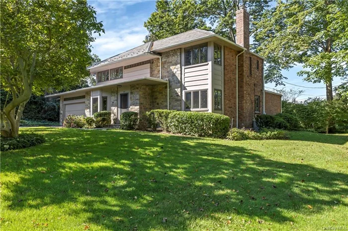 Situated in Strathmore Village on a very quiet street, this classic Central Hall Colonial with 3-4 bedrooms and 3 full baths has many special details : high ceilings, oak parquet floors, crown moldings throughout, Andersen windows. The slate roof is less than 10 years old. The central A/C unit is 5-6 years old. Eat in kitchen with stainless steel appliances and quartz counter tops. Plenty of closet space. The 2(two) car garage has an EV charging station. The attic and outside walls are fully insulated. The property is professionally landscaped and has an underground sprinkler system. Approximately 2595 square feet. Move in condition.