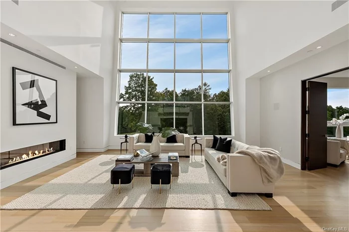 Welcome to 68 Root, an elegant retreat for the discerning modernist. This handsomely designed modern contemporary is your 6000+ square ft glass box surrounded by nature only 60 miles from midtown Manhattan, or a 1.5 hour train ride from Southeast on Metro North. Light will envelope you thanks to thoughtful architectural feature windows such as a 16 panel insulated glass feature and clerestory windows throughout. Enjoy verdant views of rolling hills and a beautiful lake from your primary bedroom, office or roof deck. This one-of-a kind property offers dramatic landscaping with terraced stone walls, stainless steel railings, a firepit and a Japanese garden. Private yet close to a variety of lifestyles. Root Ave. is located only 5m to the Centennial Gold Club, 10m to Veterans Memorial Park for summer concert evenings, 15m to Lake Mahopac, 30m to Candlewood Lake, Ridgefield, Danbury, Bedford and Katonah. Adjacent lots not included but also for sale.