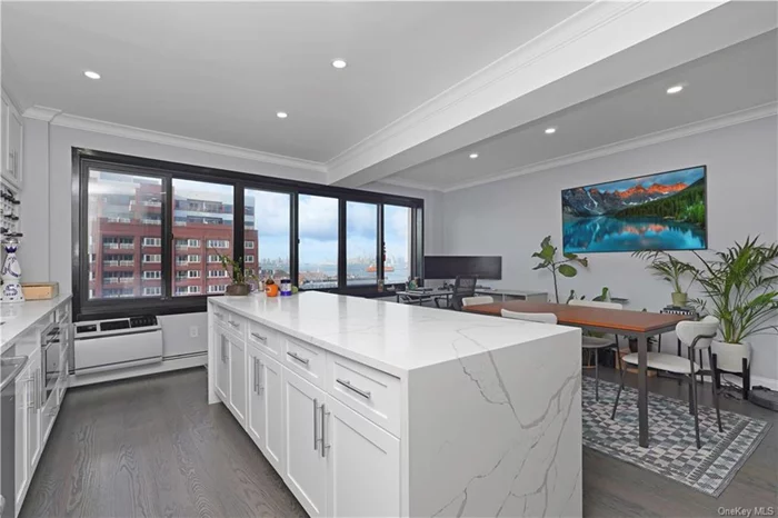 6L is a vision of modern luxury. Clean, sophisticated & completely gut renovated, from coffered ceilings to flrs, this 950 sq. ft. 1BR 1Bth unit is perfect. With views of glittering Manhattan & more, the kitchen has SS Wolf & Sub-zero appliances, a custom mrbl wrap island & backsplash, custom closets and white wood cabinets. The spacious Bth is mrbl with grey & white accents. 5 wide Oak plank flrs run throughout the home, 5 wide crown & base board moldings. Overhead strg adds to the great closets. WD. This gut renovation added more insulation to all four sides for proven quiet. Mtc incl heat, water, parkng, package collection & more. The Bay St Landing community gives you a 13 acre backyard with Tennis/Pickle ball courts, 2 great lawns, an enormous dog run, BBQ areas & more. Steps from both ferries, you can get to midtown or downtown in under 30 minutes. Restaurants & culture are all nearby. Call for an appt today!