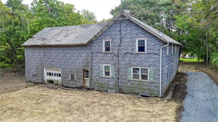 Calling all investors, contractors and those with a vision! Nestled in the heart of Marlboro, this sprawling home with an attached garage/barn presents a unique opportunity for those with a flair for restoration. Set upon a generous 1.9-acre parcel of land, this property is a canvas waiting for your creative touch. Surrounded by the natural splendor of the Hudson Valley, this property is a gateway to a lifestyle enriched by the region&rsquo;s treasures. Imagine leisurely visits to nearby wineries, vibrant farmers markets, local breweries, and adventures at nearby orchards. The possibilities for enjoyment are endless. With an open mind and a vision for revitalization, this property can become the realization of your Hudson Valley dreams. Embrace the potential, and let your passion for this enchanting region bring this home back to life. Don&rsquo;t miss this opportunity to be a part of the Hudson Valley&rsquo;s vibrant community and craft your own slice of paradise. This Marlboro property is ready for its next chapter, and it could be your restoration masterpiece!