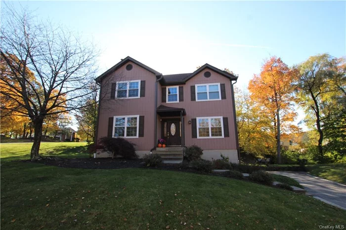 Lovely Colonial style home just listed in Woodbury Village! Charming curb appeal draws your attention to the lovely landscaping and ideal location in a cul de sac - perfect serenity & low traffic! The great flow of main level offers a large kitchen w/ granite countertops, ample cabinetry & dedicated dine in space. Dining room just off kitchen (currently set up as living space), living room just off kitchen with cozy fireplace. Sliders to the deck and rear yard offers a variety of options for use. Second level offers 3 bedrooms and full hallway bathroom. The large bright primary suite has its own expansive full bath. The lower level provides additional flexible space - playroom, home office, storage or exercise room - options abound! Two car attached garage, city SEWER and WATER, new roof 2020, new windows 2022, new water heater, hardwood floors all add to the value of this home. Community pool ($75 yearly HOA fee), and easy commuting location. Book your showing today before it&rsquo;s gone!