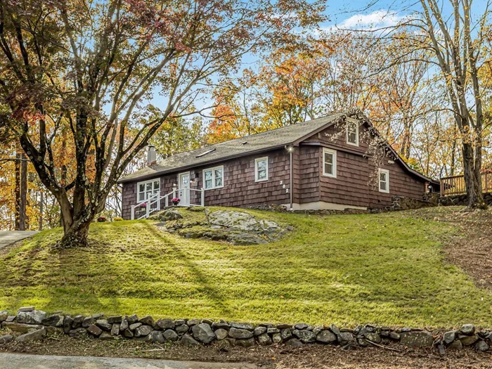 Renovated capcod style home with tasteful construction and countless upgrades. Once inside you will appreciate the flawless layout, gleaming hardwood floors new finishes, and central air. You&rsquo;re greeted with the open living room and dining room with a potential to add in a wood burning or pellet stove. Expansive kitchen is the focal point, crisp white cabinetry, stainless steel appliances and skylight makes the dream kitchen alive. The first floor offers two large bedrooms with two large baths, laundry room, sunroom out to the backyard and access to the garage. Second level offers two good size bedrooms with closet space for extra storage. Less than 1 hour to NYC and train station close by.