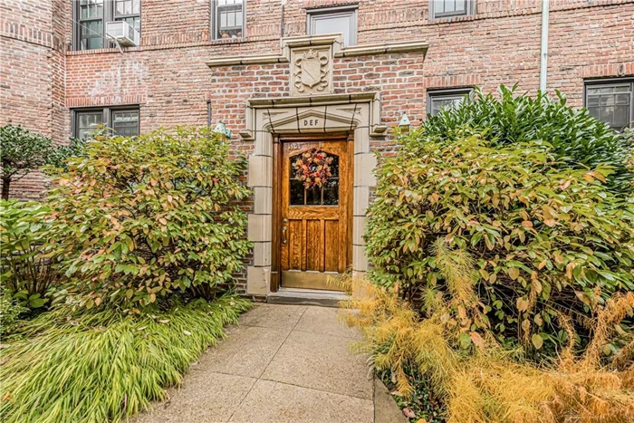 Welcome to Fieldston Gardens, a rare and timeless Tudor style building from 1929, located in the heart of Riverdale with mature and impeccably maintained landscaped gardens and a private park perfect for entertaining, relaxing and playing. Apartment 1F maintains its original architectural details: nine ft. ceilings, moldings, hardwood floors, French doors, a cedar closet and even a working dumbwaiter! Spacious entry foyer with excellent closet space, a windowed kitchen with eat-in area and room for a stackable washer/dryer (not included). French doors separate a large, bright living room with custom built-in bookcases and a dining area and the bedroom has two large closets. Windowed bathroom with full size tub. This well-maintained building with a live-in super has a laundry room, storage room and bike room and is pet friendly too (with board approval). Next to shopping and restaurants on Johnson Avenue and Riverdale Avenue and easy transportation choices include subway, local and express buses to Manhattan and Rail link to Metro-North. Don&rsquo;t miss this incredible opportunity to experience a gracious and comfortable lifestyle, call today for a private showing! Photos virtually cleared and staged.