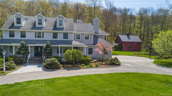 Welcome home to this Majestic Quaker Hill Colonial. Perfectly nestled on a private level parcel complete with mature trees, fieldstone walls, tranquil pond and an exquisite 24&rsquo;x36&rsquo; post & beam barn constructed in 2016. The house itself features a rocking chair covered porch, oversized mahogany back deck, 3 car attached garage and circular driveway. Once inside there&rsquo;s plenty of room to roam with over 4000 square feet of hardwood and tiled floors. The 1st floor boasts a huge kitchen with granite tops, SS appliances, new tile floor in 2024, pantry, mud/laundry room, powder room, formal dining room, family room and an open living room complete with fireplace, crown moldings and views of the private back yard. Adjacent to the living room is a private en suite with French doors allowing access to the spacious back deck. Moving upstairs you will find generously sized bedrooms, California closets, primary bath, hall bath, a library/sitting room and an oversized home office with a fireplace & an abundance of natural light. Moving upstairs once again to the 3rd floor you will be greeted by 895sq feet of plushy carpeted media room perfect for entertaining or perhaps a night of theater. Other amenities include security system, heated garage with high ceilings, 2 year old boiler, recessed lighting, tiled backsplashes, fenced in garden with raised beds, dog pens and more. All this just minutes to the quaint Village of Pawling with charming boutique shops, eateries, a pub and the Pawling Metro North Train Station. Close to Thunder Ridge Ski Resort, Cranberry Mountain Preserve/Hiking and just 90 minutes to NYC by car or train. Come take a look, this property has it all!