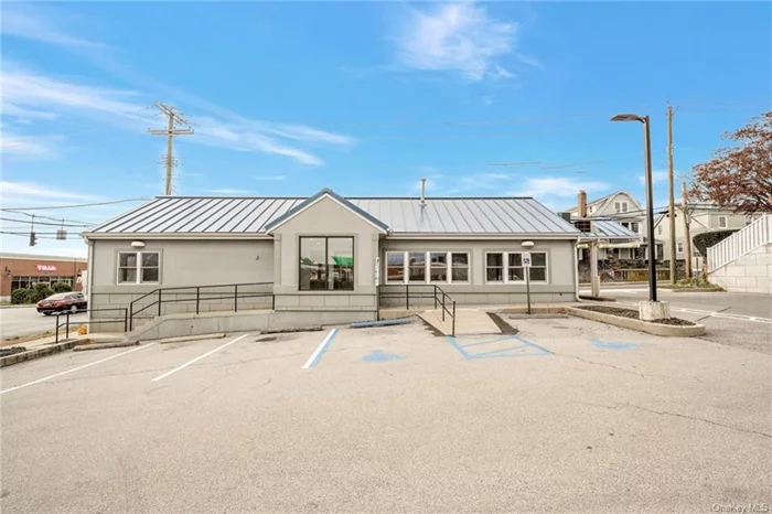 Exceptional opportunity to lease prime location - built-out former bank with parking lot - drive thru window 2-lanes - Commercial Business use zoning is now available for many possibilities. High visibility and traffic area. Close to all parkways and public transportation.