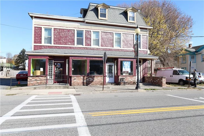 Double storefront with two apartments upstairs. All units currently rented for $5900 a month income. . APARTMENTS ARE 3/2 ON SECOND FLOOR AND 1BR/LOFT ON THIRD FLOOR WITH THE TWO STOREFRONTS.