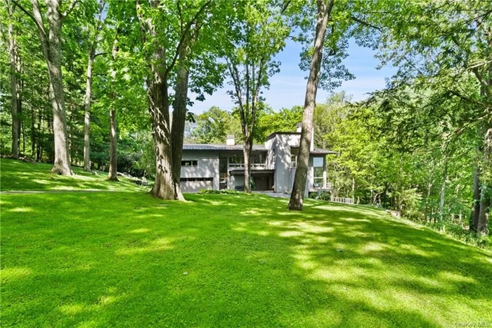 Welcome to your picturesque and dream rental, with breathtaking falling waters overlooking the rushing Mill River and one of the Twin Ponds. Water views and stunning interior design come together to create an unforgettable getaway experience.  Contemporary home designed by noted architect Vuko Tashkovich who worked for the architects Eliot Noyes, John M. Johansen and I. M. Pei & Partners.  This gorgeous property boasts floor-to-ceiling windows that offer dramatic panoramic views of the surrounding landscape, providing an immersive and relaxing atmosphere for all guests. Inside, this modern house boasts a spacious and open floor plan which furnished stylishly by linge Roset, Cappellini and Minotti. The kitchen is fully equipped with all the necessary appliances and tools to prepare gourmet meals, and the living room offers an ideal space to relax.  The private Master Suite has a walk-in Dressing Room. Opulent Master Bath has luxurious radiant heat. Three additional Bedrooms including private Guest Bedroom. The home has every amenity including elevator and automatic generator. Covered Dining Terrace overlooking the heated salt-water pool. There is a pool house with a changing room, bath and outdoor shower.   Step outside and enjoy the great outdoor space with a large pool and Jacuzzi perfect for lounging in the sun or taking a refreshing dip. With ample outdoor seating areas, you can enjoy al fresco dining or simply take in the stunning scenery as you unwind with your loved ones.  Lake has a dock- perfect for kayaking, fishing, etc. Over three landscaped acres with specimen trees and flowering. The outdoors have mature specimen plantings including Japanese Maples and Weeping Beech.  Located in a cul de sac the home is a sanctuary of privacy in the heart of Pound Ridge, minutes to the charming town of Pound Ridge, Scotts Corners, with farmers markets and an array of eclectic shops, a European fine bakery and restaurants. Whether you&rsquo;re looking to hike, bike, or simply relax and soak up the stunning river and lake views, this modern house is the perfect place to call home. Book now and start creating unforgettable memories that will last a lifetime.